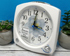 Budzik SEIKO QHP012W 12x13 cm śpiew ptaków melodie regulacja głośności